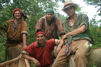 a team of interpreters inside part of voyageurs, Fort William.